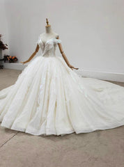 Looking For Cute And Stylish Luxury Champagne Tulle Backless Beading Wedding Dresses With Train