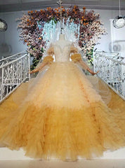 Yellow Ball Gown Tulle Long Sleeve Open Back Wedding Dresses With Beading